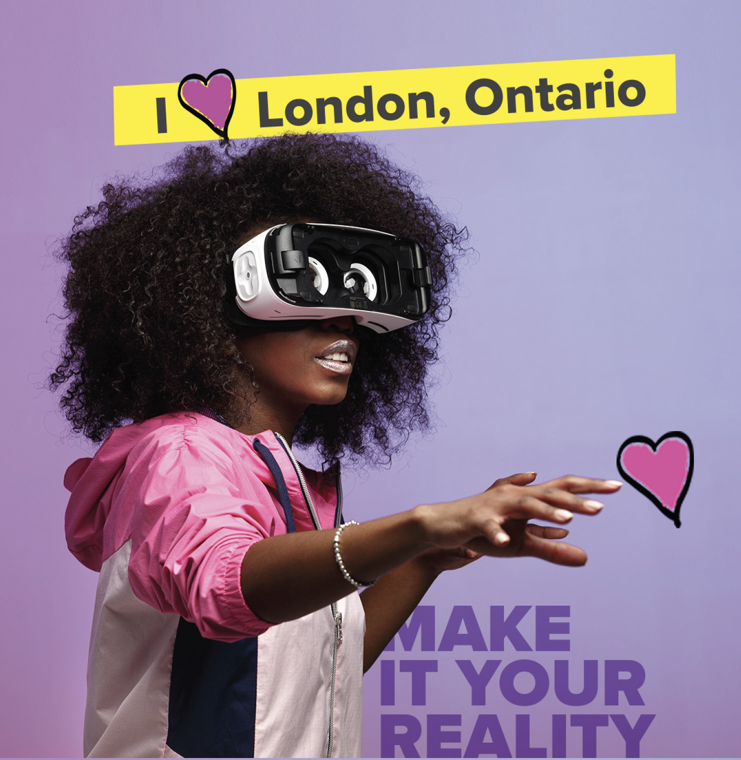 A woman wearing VR goggles. The banner reads I love London Ontario. The headline reads: Make it your reality.